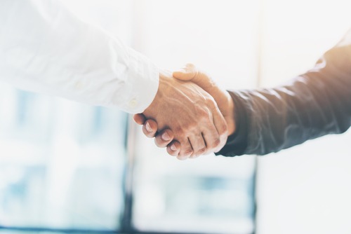 two men shaking hands